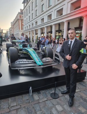 security guard in-front of car
